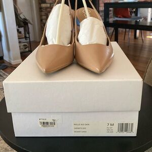 Calvin Klein tan sling back pumps. Brand new in box. Size 7